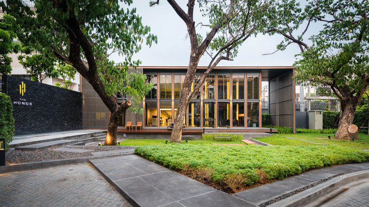 Godrej Pune Kharadi grand clubhouse exterior with landscaped garden and trees